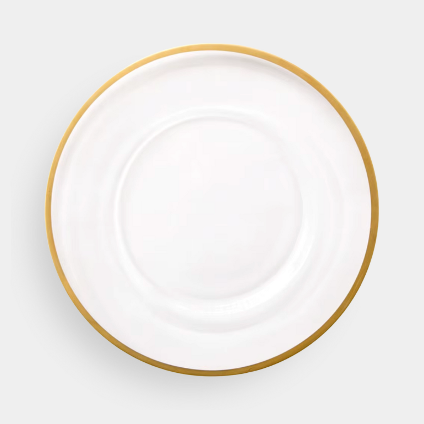 The Halo Clear Glass Charger with Gold Rim